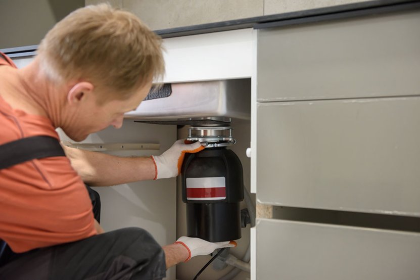 plumber installing a garbage disposal Cuyahoga Falls, OH