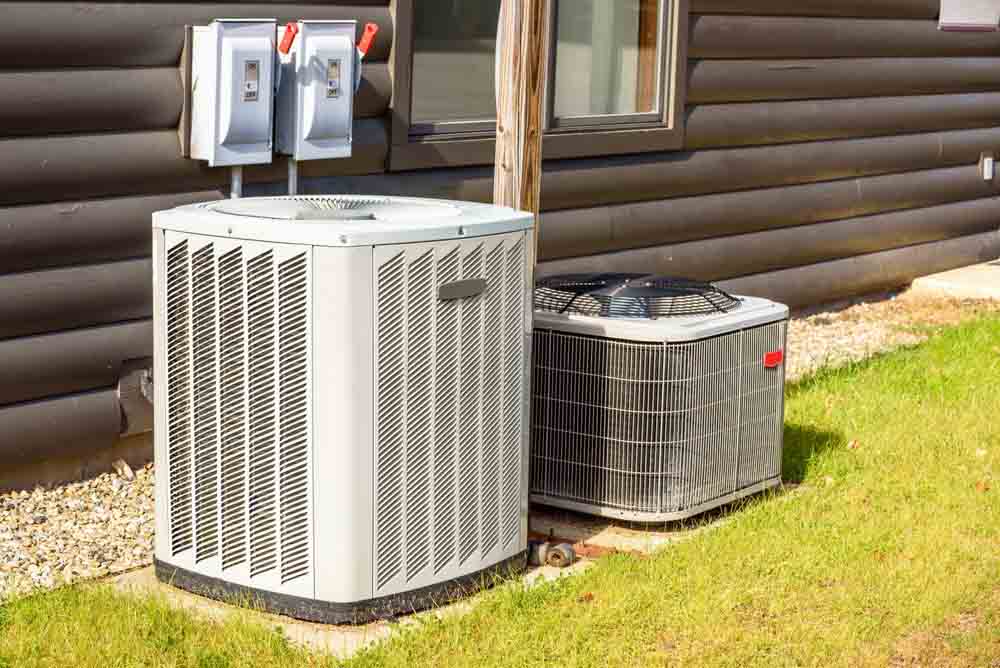 HVAC technician inspecting a home