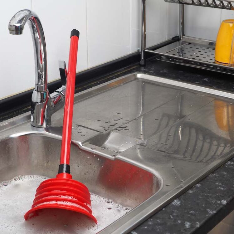 Clogged,Pipes,In,The,Kitchen.,Sink,Full,Of,Dirty,Water, Clogged pipes in the kitchen. Sink full of dirty water, red plunger